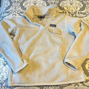 Patagonia quarter snap fleece pullover. Cream colored and size small.